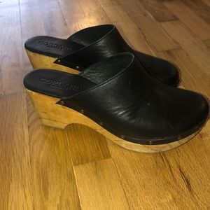 Black wood clogs